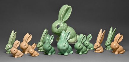 Thirteen Shaw & Copestake Sylvac green or brown glazed earthenware models of rabbits, various sizes,