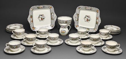 A Wedgwood bone china tea service, early 20th c, with black seaweed border, the service including