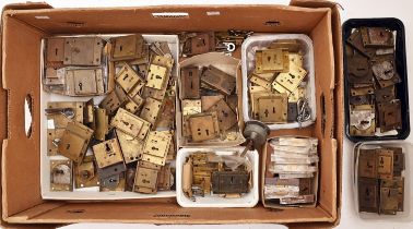 An extensive collection of principally English brass cabinet locks, 19th - early 20th c, several