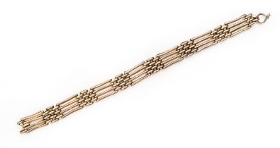 A gold gate bracelet, 18cm l, marked 9c, 10g Slightly dented and worn