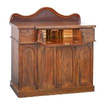 A Victorian mahogany breakfront secretaire sideboard, the lower part enclosed by panelled doors,