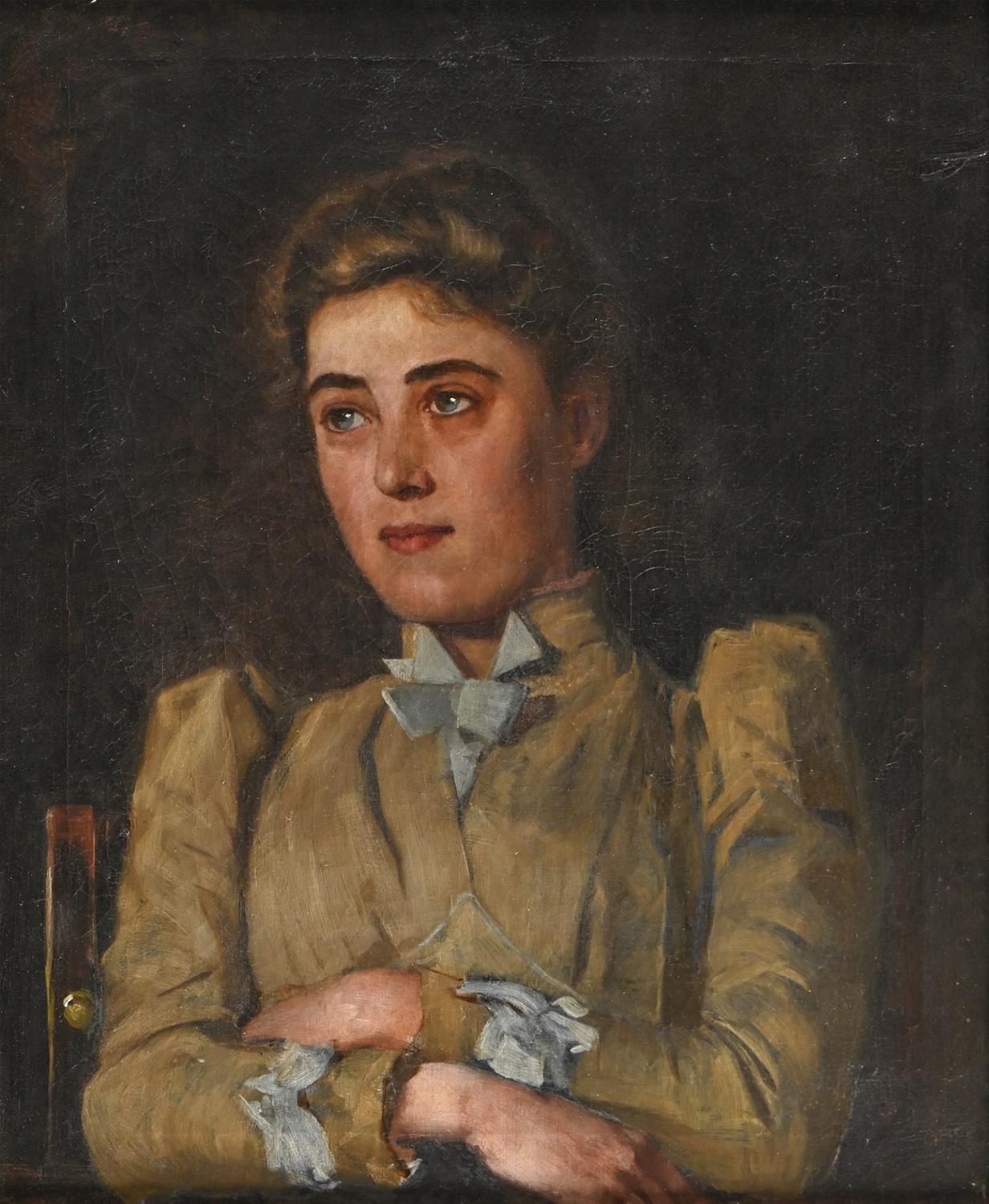 British School, early 20th c - Portrait of a Young Woman, bust length with arms folded, seated,