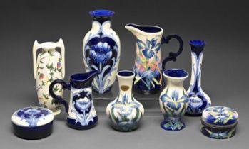 Five Old Tupton Ware vases, two jugs and two boxes and covers, decorated in Moorcroft style, various