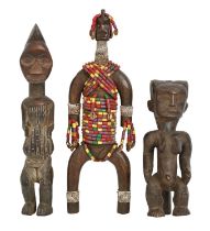 Tribal art. West Africa - a Baule carved figure, a Namchi Namji (Cameroon) fertility doll and