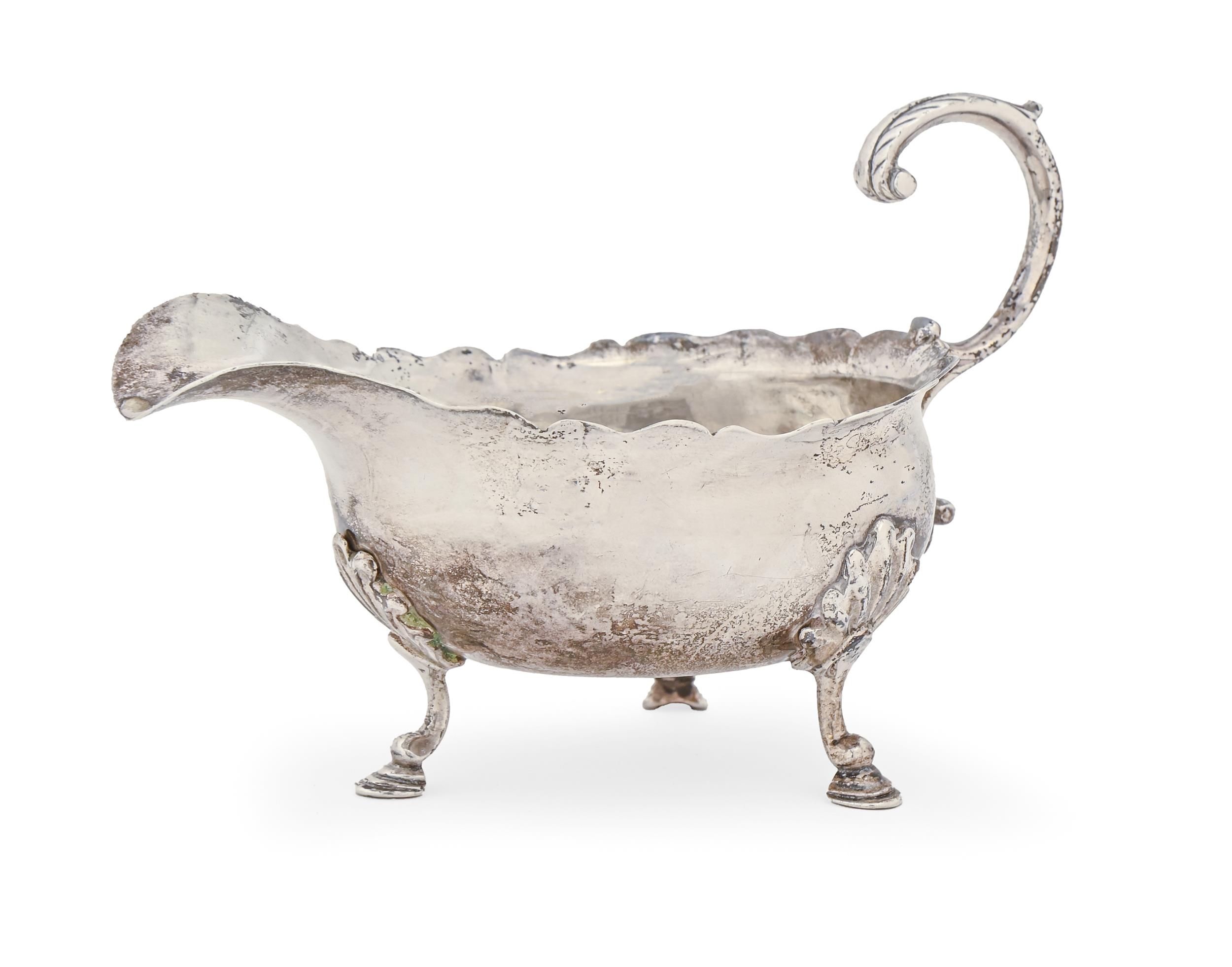 An 18th c silver sauceboat, 15cm l, marks rubbed, London, 5ozs