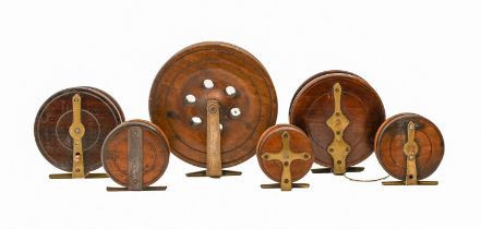 Six Nottingham style mahogany and other fishing reels, c1900, 6.5-15cm Minor knocks and scratches,