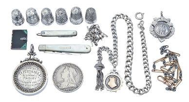 A gold and bi-metal albert, two silver alberts and other silver articles, including watch fob