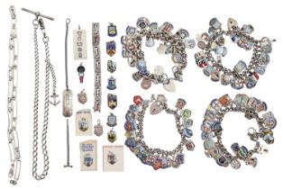 Four silver charm bracelets, with an extensive collection of enamelled silver shields and various