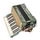 A Hohner Carmen II piano accordion, 42cm w, in original carry case