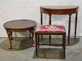 A mahogany dressing stool, a serpentine mahogany hall table and a walnut occasional table, early