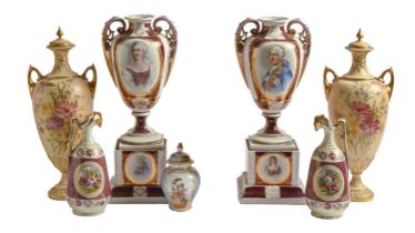 A pair of Royal Worcester two handled vases and covers, printed puce mark 1921, 35cm h and a pair of