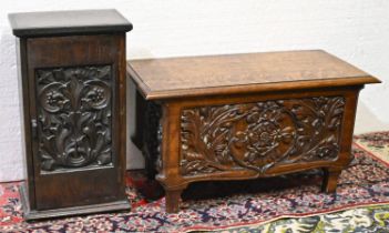 An antique style panelled and carved oak blanket box, 116cm l; 53 x 57cm, another smaller and an oak