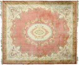 A large rug, 365 x 319cm