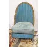 A Lloyd Loom nursing chair