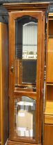 A stained wood china cabinet, with adjustable shelves, 195cm h