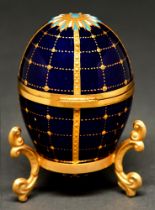 A Lynton silver gilt mounted egg, 1988, painted to the underside of the lid by S D Nowacki,