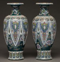 A pair of Japanese earthenware vases, early 20th c, enamelled with white bordered lappets, 31.5cm h,