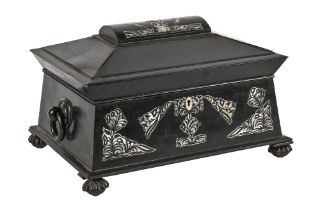 A Victorian ebony sarcophagus shaped work box, with ring handles, inlaid with mother of pearl,