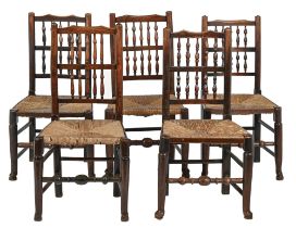 Five ash spindle back chairs, North West England, 19th c, rush seated Two with some movement