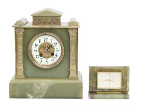 A giltmetal mounted onyx architectural mantel clock, with enamel dial, pendulum, 29cm h x 23.5cm w