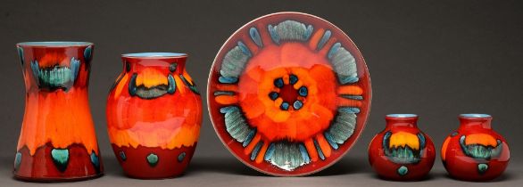 Two and a pair of Poole Pottery Volcano vases and a plate, late 20th c, largest vase 21cm h, printed