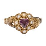 A Victorian heart shaped ruby and split pearl ring, with hand shoulders, in 15ct gold, Birmingham
