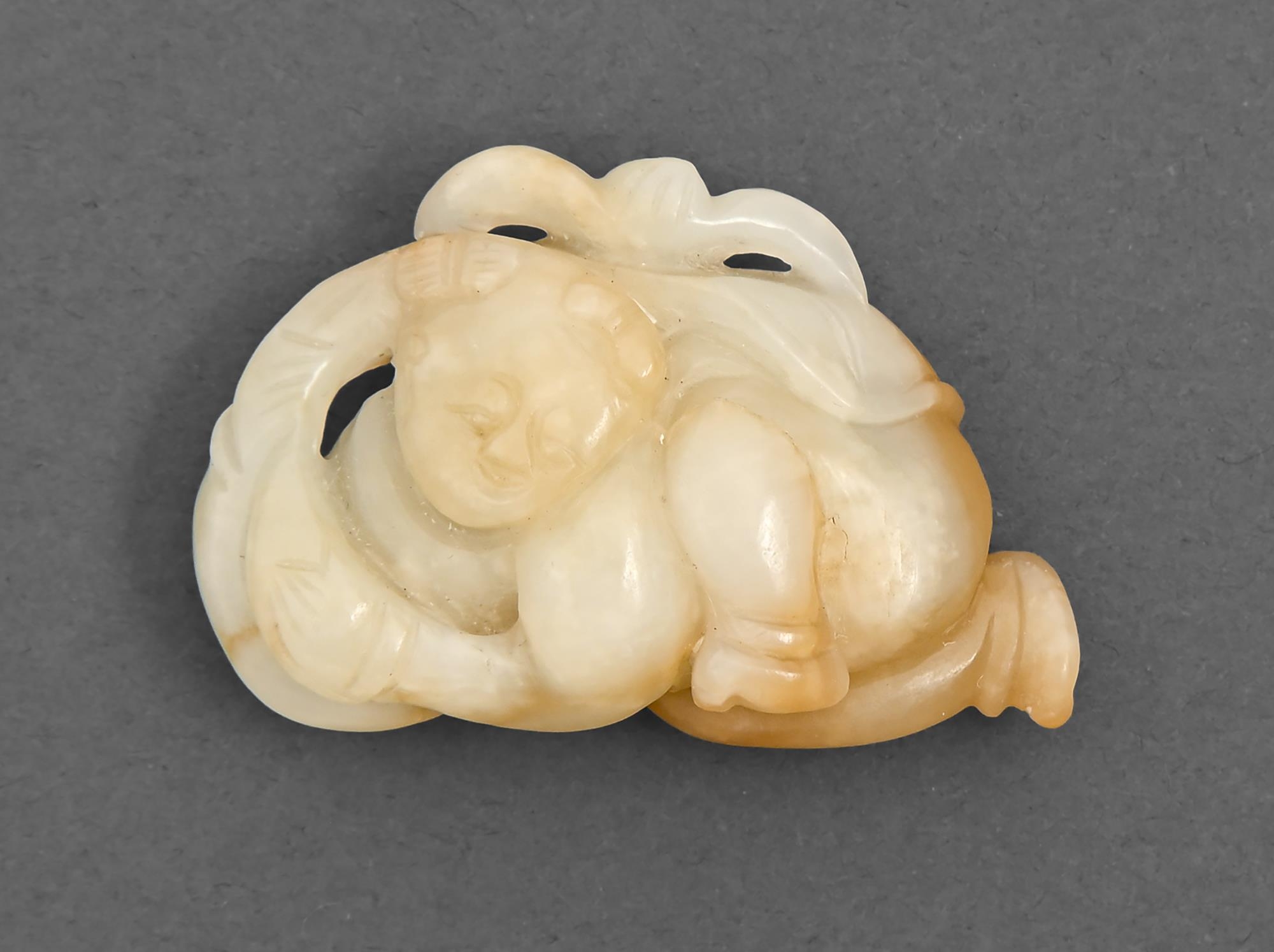 A Chinese jade pebble carving of a boy, 48mm l Undamaged