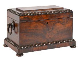 A Victorian rosewood tea chest, bead and reel mouldings, the fitted mahogany interior retaining pair