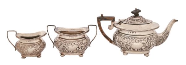 A Victorian silver bachelor's tea service, on bun feet, teapot 13.5cm h, by Joseph Gloster,