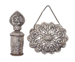 A Turkish silver repousse mirror, 20th c, of cusped oval shape with chain handle, 14cm l, marked