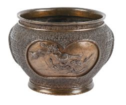 A Chinese bronze jardiniere, early 20th c, the three panels decorated with birds in flight, 14cm