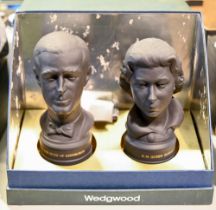 A pair of Wedgwood black basalt busts of Queen Elizabeth II and the Duke of Edinburgh to