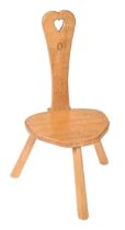 An Alan 'Acornman' Grainger oak stool, 1958-2005, 98cm h, carved acorn ' signature' Good condition