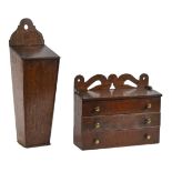 A Victorian wall hanging oak candle box, 27cm h and another, of tapered form (2)