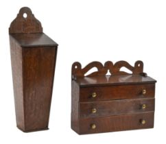 A Victorian wall hanging oak candle box, 27cm h and another, of tapered form (2)