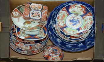 A collection of Japanese Imari and blue and white Imari bowls and dishes, Meiji period and 20th c,