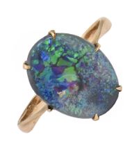 A black opal ring, in gold marked 9c, 2.2g, size P Opal scratched / worn. Hoop worn and bent