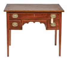 A George III mahogany and line inlaid lowboy, with shaped apron, on square tapered legs, 71cm h;