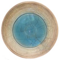 Studio pottery. John Dunn (1944 - ) - Dish, speckled, iridescent raku glaze, 57cm diam, signed