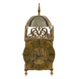 An English brass lantern clock, c1900, in 17th c style, pendulum and key, 36cm h; 17cm w over dial