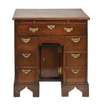 A George III mahogany knee dressing table, with brushing slide and apron drawer, 78cm h; 47 x 76cm