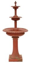 A cast iron garden fountain, 20th c, in Victorian style, in the form of three graduated campana
