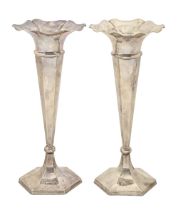 A pair of George V silver vases, on hexagonal foot, 29cm h, by James Deakin & Sons, Sheffield