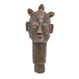 Tribal art. A West African carved wooden head, possibly Igbo Nigeria, early 20th c, 58cm h