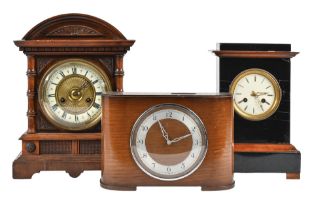 An English oak coin-in-the-slot mantel clock, c1940, with black plastic slot in the top 2 FLORINS