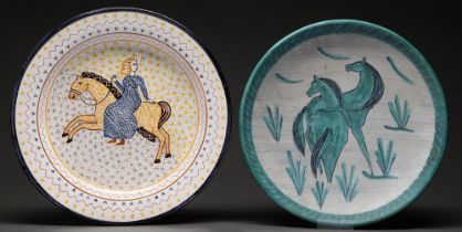 A Continental tin glazed earthenware charger and a Swiss earthenware dish, c1960s / 70s, painted
