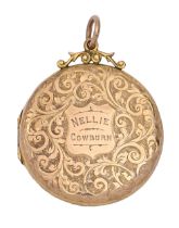 An Edwardian 9ct gold locket, engraved overall with leafy scrolls, 34mm diam, by Sheldon Brothers,