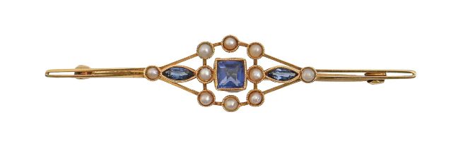 A sapphire and split pearl bar brooch, c1930, in gold, including pin, 56mm l, marked 18ct, 3.5g Good
