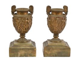 A pair of French fin de siecle spelter gilt copies of the Townley vase, c1900, on green onyx plinth,
