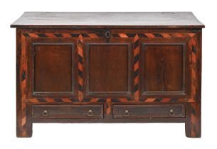 A George III oak mule chest, the three-panel front with holly and bog oak stringing, 76cm h; 54 x